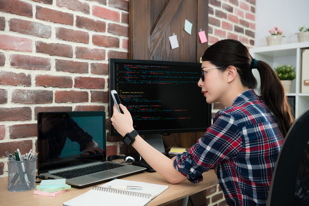 business woman sets up surveillance systems